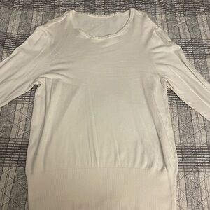 White sweater, willing to negotiate